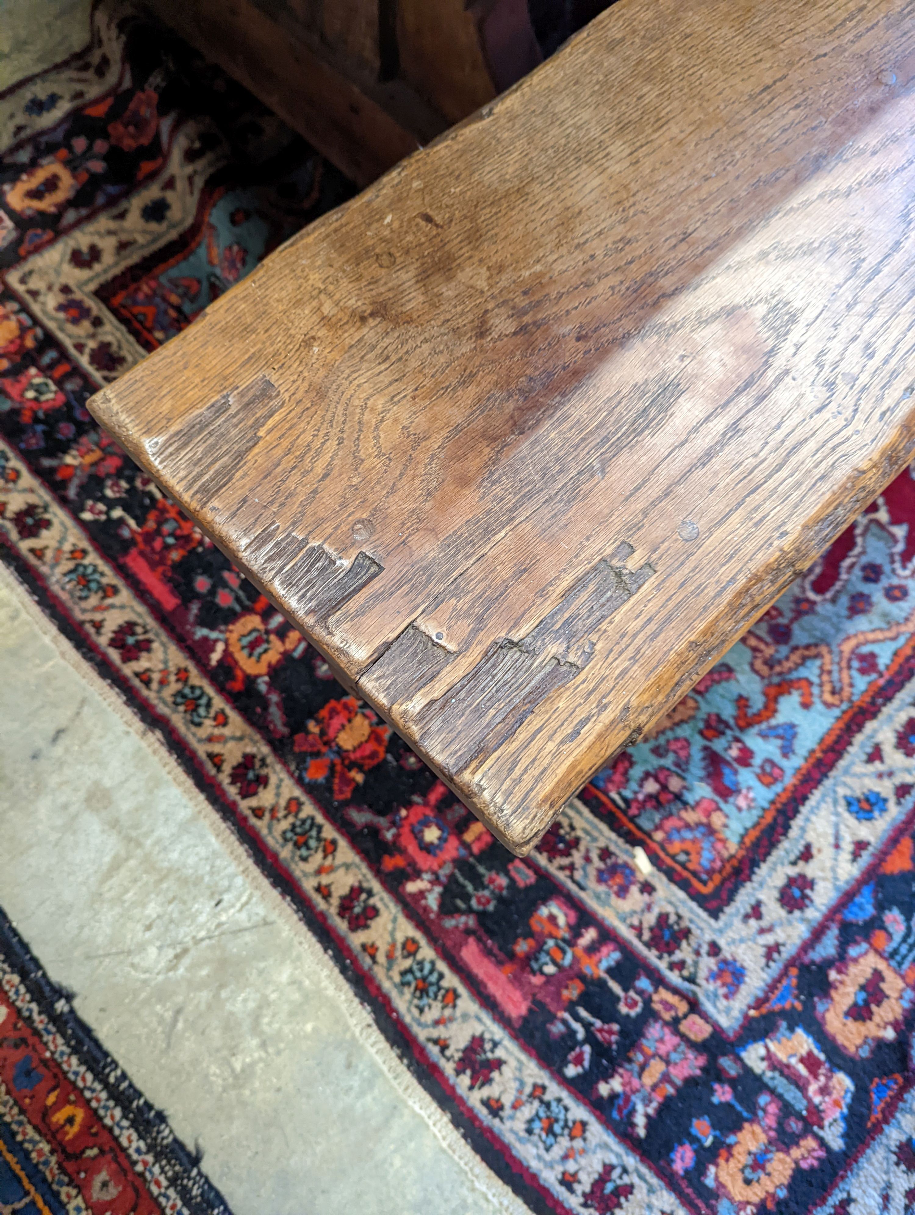 A pair of 18th century style oak benches, length 234cm, depth 30cm, height 46cm